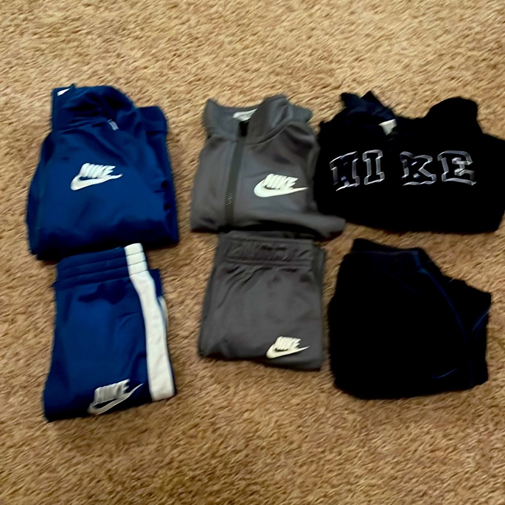 3 Nike tracksuits